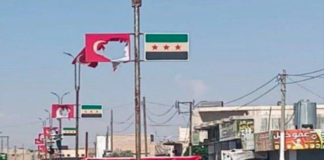 Fırat Kalkanı Bölgesinde Türkiye Karşıtı Gösteriler: TIR’lara Saldırılar ve Bayrakların Parçalanması