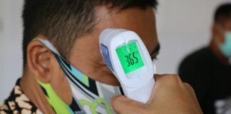 İPA Raporu: İstanbul’un Sağlık Karnesi ve Kritik Sorunlar man in green white and blue shirt wearing white and blue digital watch