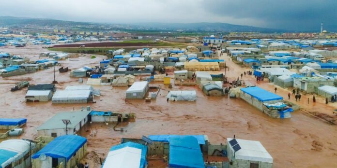 A large group of tents in the middle of a field