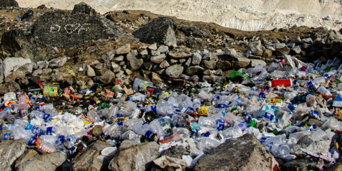 rocky mountain covered with snow during daytime
