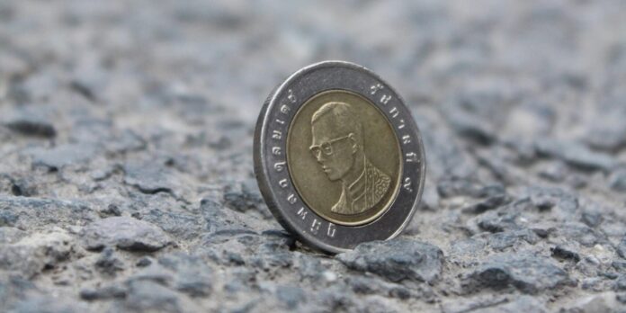 silver and gold round coin